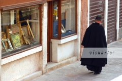 Priest walking in Dorsoduro